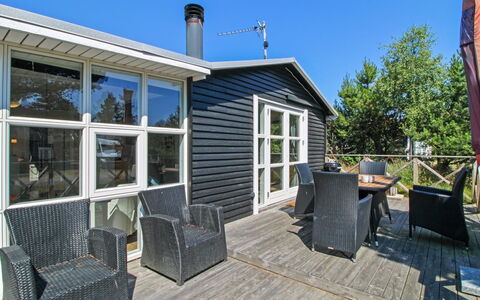 Olof - 100M from the Sea: Roof, Home, Door, Cottage, Shade, Siding, Yard, Estate, Backyard