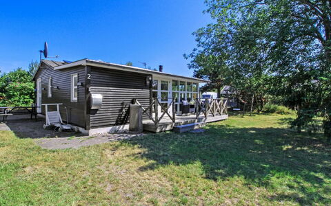 Olof - 100M from the Sea: Roof, Home, Door, Cottage, Shade, Siding, Yard, Estate, Backyard