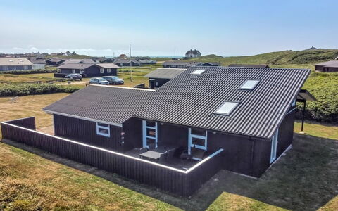 Hroswitha - 100M from the Sea: Roof, Home, Door, Cottage, Shade, Siding, Yard, Estate, Backyard