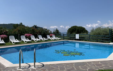Garda 54: Water, Sky, Property, Swimming Pool, Plant, Cloud, Rectangle, Leisure, Composite Material, Shade
