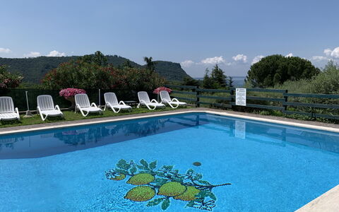 Garda 54: Water, Sky, Swimming Pool, Cloud, Azure, Rectangle, Outdoor Furniture, Tree, Plant, Leisure