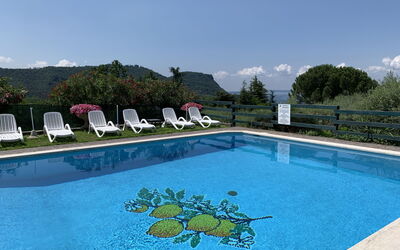 Garda 54: Water, Sky, Swimming Pool, Cloud, Azure, Rectangle, Outdoor Furniture, Tree, Plant, Leisure