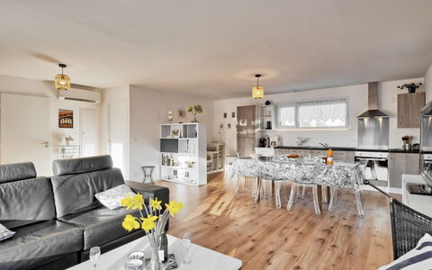 La K'Bane sur Mer: Table, Furniture, Property, Couch, Flower, Interior Design, Living Room, Picture Frame, Yellow, Flooring
