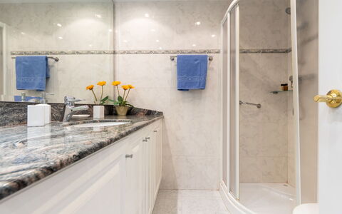 International: Tap, Plumbing Fixture, Countertop, Cabinetry, Building, Bathroom, Interior Design, Flower, Flooring, Floor