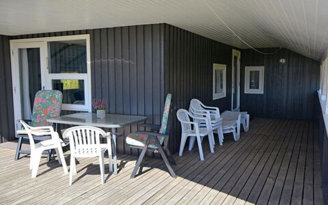 Igilfar - 700M from the Sea: Wood, Furniture, Hardwood, Wood Stain, Plank, Deck, Shade, Porch, Wood Flooring, Chair