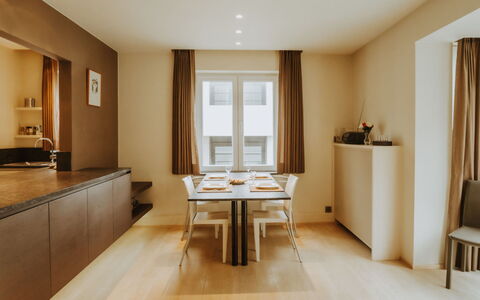 Goethe Close to the Beach: Table, Furniture, Property, Building, Window, Chair, Plant, Wood, Curtain, Interior Design