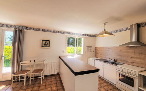 Le Large: Kitchen, Furniture, Flooring, Interior Design, Countertop, Wood, Floor, Ceiling, Major Appliance, Lighting