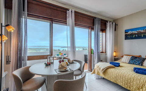 Alvor Bay Dream: Furniture, Interior Design, Floor, Apartment, Room, Bed, Bedroom, Resort, Hotel, Chair