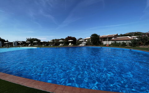 Lidia Capo Ceraso Resort: Water, Sky, Cloud, Building, Swimming Pool, Plant, Blue, Rectangle, House, Natural Landscape
