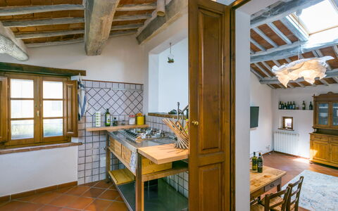 Casa Campau: Furniture, Window, Cabinetry, Countertop, Kitchen, Wood, Table, Kitchen Sink, Interior Design, Picture Frame