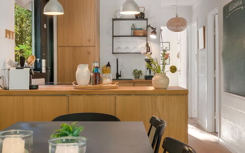 Olaf - 1.4Km from the Sea: Furniture, Kitchen, Countertop, Interior Design, Wood, Light Fixture, Room, Cabinetry, Kitchen & Dining Room Table, Tableware