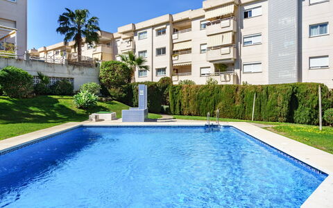 Loma del Colegial: Water, Sky, Building, Plant, Cloud, Property, Azure, Swimming Pool, Tree, Architecture