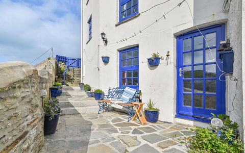 Dolphin Cottage: Plant, Furniture, Building, Property, Table, Chair, Shade, Window, Interior Design, Lighting