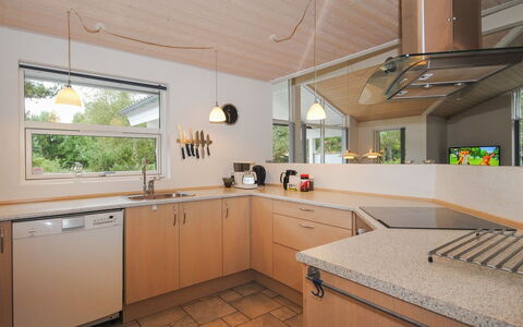 Tamika - 950M from the Sea: Countertop, Kitchen, Interior Design, Flooring, Cabinetry, Wood, Furniture, Light Fixture, Ceiling, Kitchen Appliance