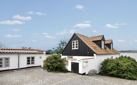 Pauliina - 10M to the Fjord: Building, Window, Roof, House, Home, Residential Area, Architecture, Facade, Door, Cottage
