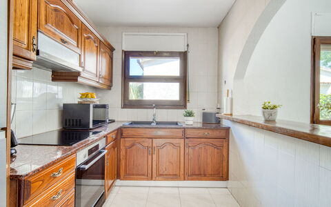 Paquita: Kitchen, Countertop, Kitchen Appliance, Interior Design, Major Appliance, Flooring, Cabinetry, Wood, Kitchen Sink, Furniture