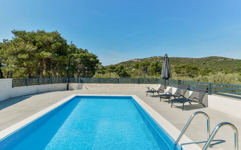 Gušt: Water, Sky, Property, Swimming Pool, Azure, Shade, Rectangle, Outdoor Furniture, Tree, Leisure