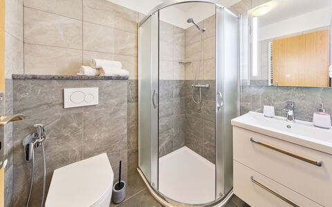 Marika: Bathroom, Plumbing Fixture, Interior Design, Flooring, Floor, Bathroom Sink, Sink, Toilet, Tap, Mirror