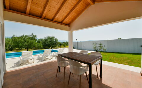 Elena: Table, Plant, Shade, Outdoor Furniture, Wood, Interior Design, Building, Flooring, Tree, Roof