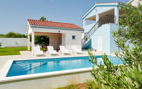 Elena: Water, Plant, Sky, Property, Azure, Swimming Pool, Building, Shade, Outdoor Furniture, Residential Area