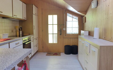Chalet Vamika: Property, Cabinetry, Furniture, Window, Wood, Interior Design, Building, Architecture, Floor
