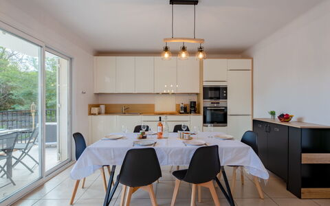 Le Cyrnos: Table, Furniture, Property, Chair, Wood, Cabinetry, Kitchen, Interior Design, Rectangle, Flooring