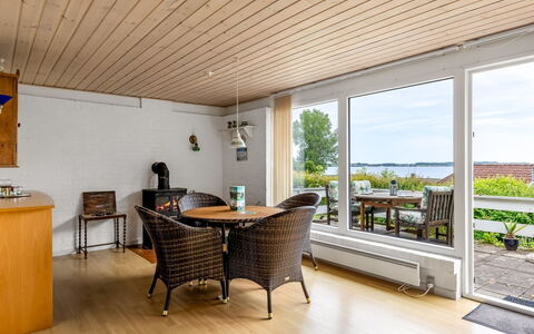 Tekla - 70M to the Fjord: Furniture, Flooring, Floor, Wood, Interior Design, Wood Flooring, Ceiling, Chair, Table, Hardwood