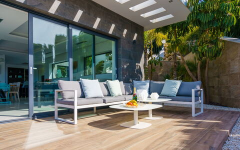 Villa Adonia: Sky, Building, Property, Water, Plant, Azure, Swimming Pool, Architecture, Tree, Condominium