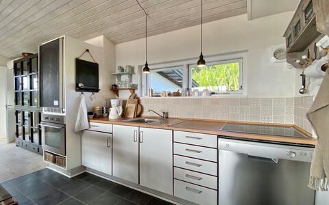 Frithger - 300M from the Sea: Kitchen, Countertop, Interior Design, Flooring, Cabinetry, Wood, Ceiling, Furniture, Kitchen Appliance, Major Appliance