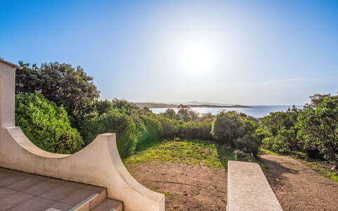 Villa Bruzzi: Sky, Blue, Horizon, Shrub, Sunlight, Ocean, Landscaping, Coast, Walkway