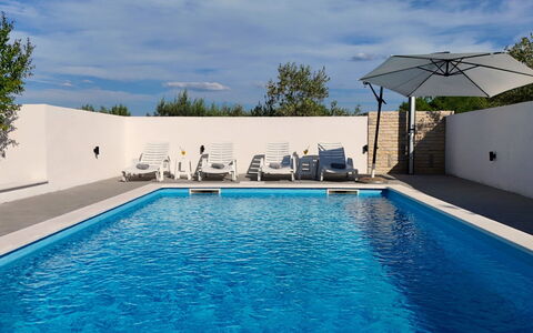 Karlo: Swimming Pool, Blue, Outdoor Furniture, Resort, Composite Material, Sunlounger, Shade, Chair, Hotel, Water Feature