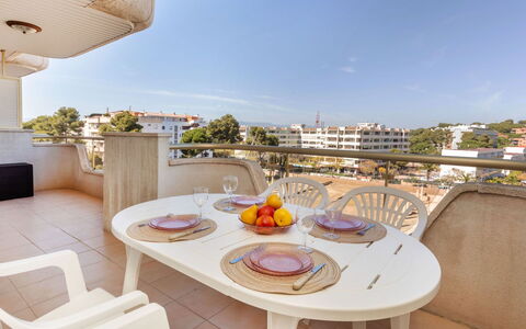 Arquus: Sky, Table, Furniture, Property, Tableware, Building, Chair, Outdoor Furniture, Food, Interior Design