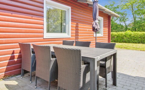 Aku - 24Km from the Sea: Wood, Outdoor Furniture, Furniture, Wood Stain, Hardwood, Chair, Outdoor Table, Shade, Deck, Plank