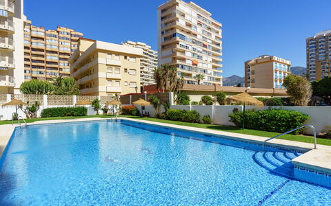 Fuengirola Beach View: Table, Plant, Building, Sky, Cloud, Wood, Porch, Shade, Interior Design, Chair