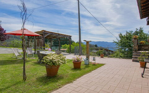 Delle Stelle: Table, Plant, Building, Sky, Cloud, Wood, Porch, Shade, Interior Design, Chair
