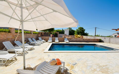 Villa Meri: Water, Property, Furniture, Sky, Azure, Swimming Pool, Building, Outdoor Furniture, Shade, Sunlounger