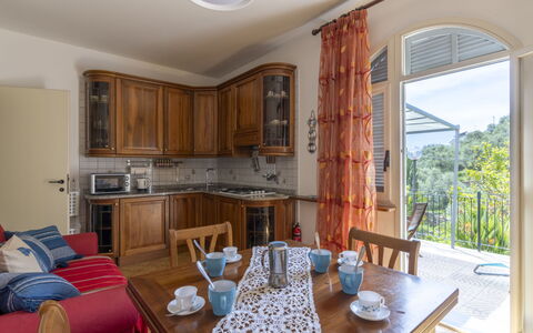 Paradiso tra Gli Ulivi: Cloud, Plant, Sky, Property, Building, Window, Tree, Land Lot, Table, House