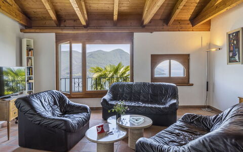 Porta: Furniture, Property, Couch, Plant, Comfort, Wood, Shade, Interior Design, Living Room, Building