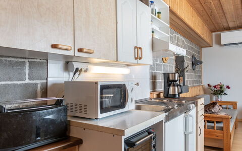 Jokiniitty 2: Kitchen, Kitchen Appliance, Countertop, Major Appliance, Furniture, Cabinetry, Kitchen Stove, Interior Design, Wood, Home Appliance
