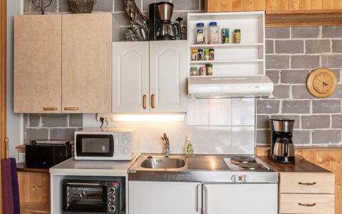 Jokiniitty 2: Kitchen Appliance, Kitchen, Major Appliance, Countertop, Cabinetry, Furniture, Home Appliance, Wood, Kitchen Stove, Interior Design