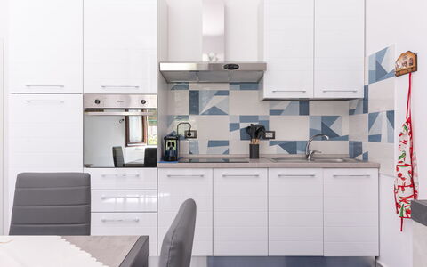 Sanda: Cabinetry, Property, Countertop, Kitchen Stove, Sink, Kitchen Sink, Tap, Kitchen, Interior Design, Drawer