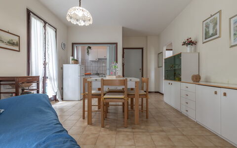 Conero Garden Apartment: Table, Picture Frame, Furniture, Door, Cabinetry, Chair, Wood, Building, Drawer, Flooring