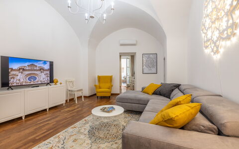 Corte Tiso: Couch, Furniture, Property, Table, Picture Frame, Comfort, Interior Design, Wood, Lighting, Building