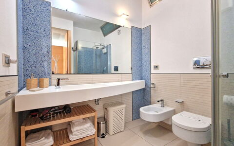 Suite Le Vele: Bathroom, Flooring, Floor, Plumbing Fixture, Interior Design, Bathroom Sink, Wall, Wood, Sink, Tap