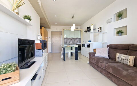 Suite Le Vele: Interior Design, Flooring, Furniture, Floor, Room, Ceiling, Apartment, Living Room, Television, Home