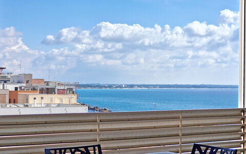 Suite Le Vele: Blue, Body Of Water, Horizon, Sea, Ocean, Coastal And Oceanic Landforms, Balcony, Coast, Apartment, Beach