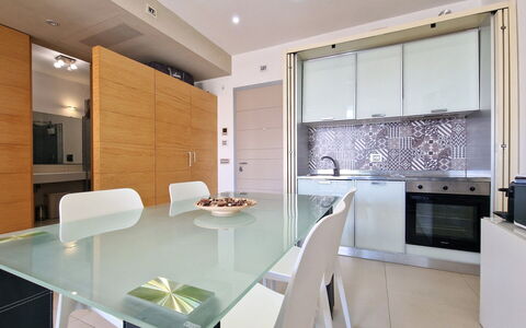 Suite Le Vele: Furniture, Interior Design, Flooring, Floor, Wood, Kitchen, Countertop, Kitchen Appliance, Ceiling, Major Appliance