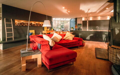 Domicile Adoré with Garden: Property, Furniture, Couch, Comfort, Decoration, Wood, Orange, Interior Design, Flooring, Living Room