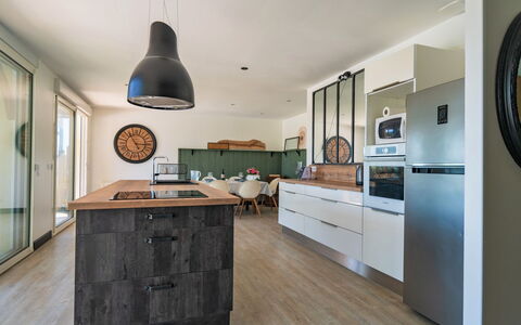 Bourgat: Cabinetry, Countertop, Kitchen, Drawer, Lighting, Wood, Interior Design, Flooring, Floor, Building