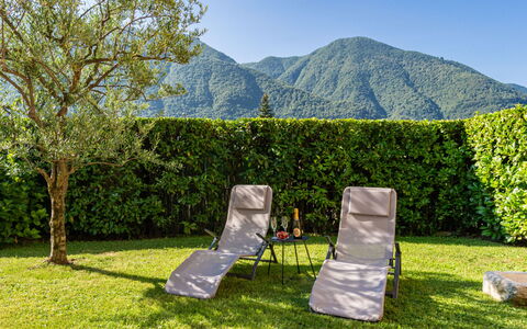 Stazione: Sky, Plant, Furniture, Plant Community, Mountain, Natural Landscape, Tree, Outdoor Furniture, Chair, Land Lot